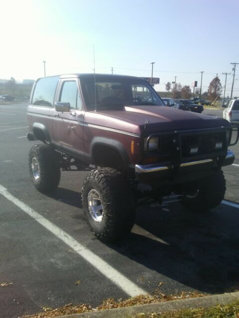 1986 Red Ford Bronco SUV