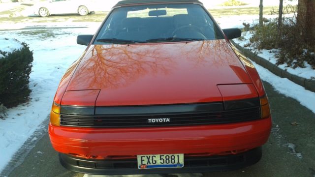 1989 red Toyota celica Convertible
