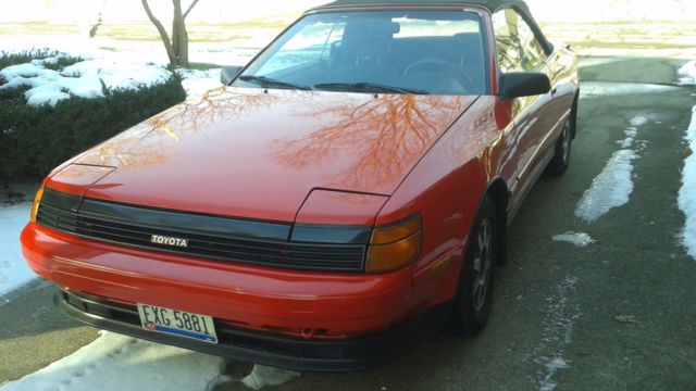 1989 red Toyota celica Convertible
