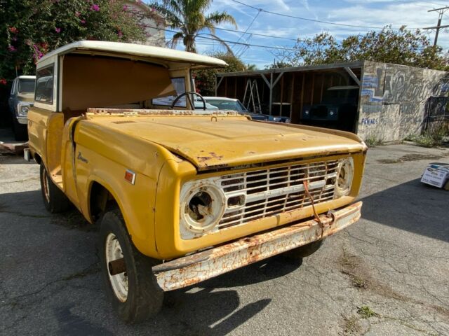 1966 Yellow Ford Bronco SUV