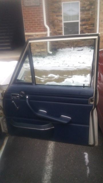 1970 White Mercedes-Benz 200-Series Sedan