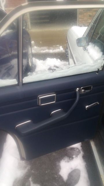 1970 White Mercedes-Benz 200-Series Sedan