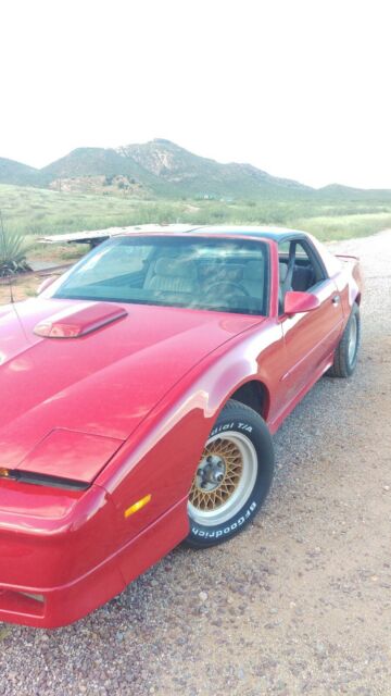 1989 Red Pontiac Firebird Coupe
