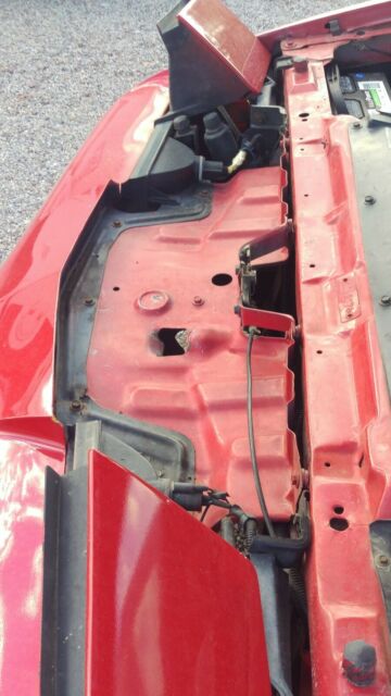 1989 Red Pontiac Firebird Coupe