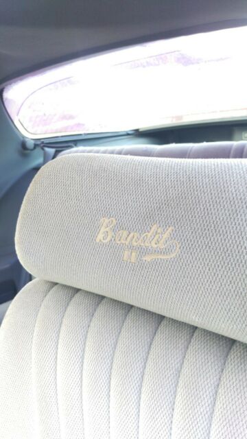 1989 Red Pontiac Firebird Coupe