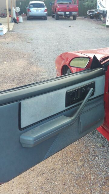 1989 Red Pontiac Firebird Coupe