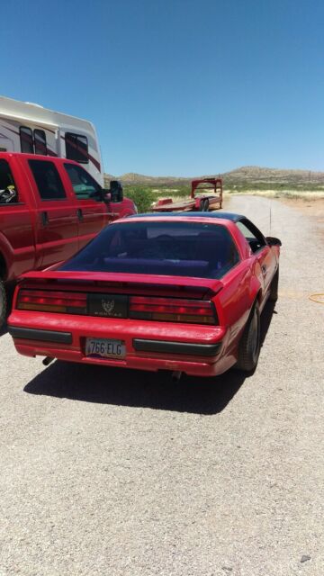 1989 Red Pontiac Firebird Coupe