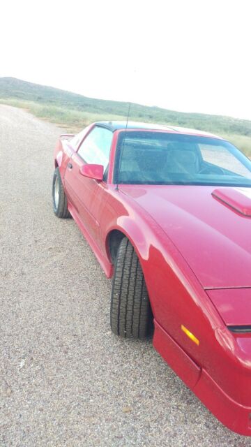 1989 Red Pontiac Firebird Coupe