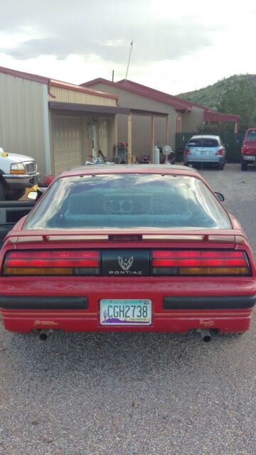 1989 Red Pontiac Firebird Coupe