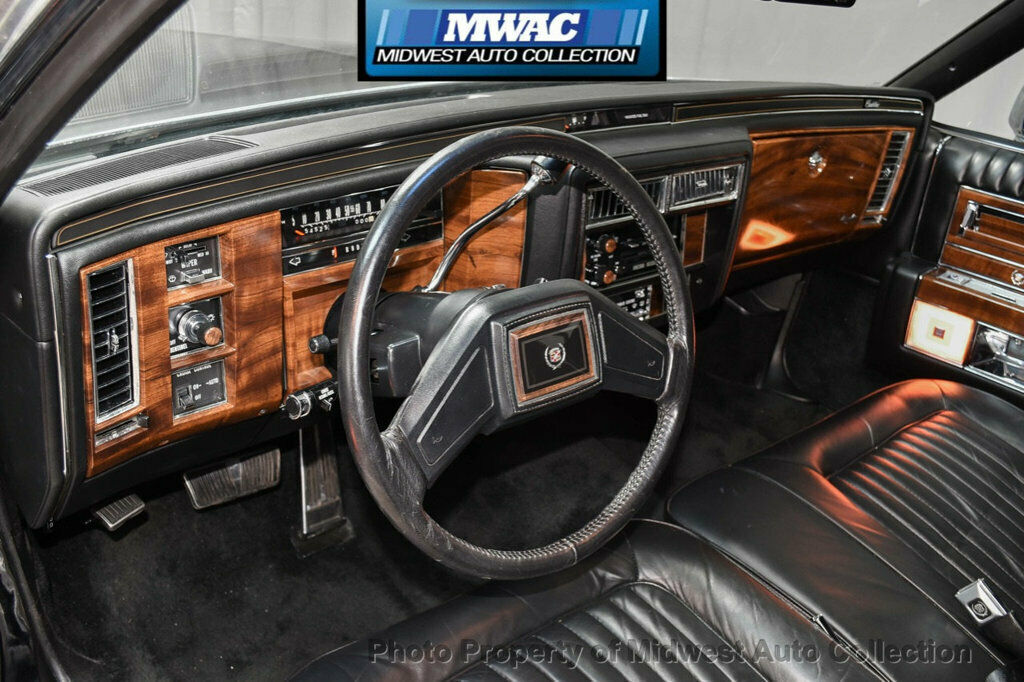 1989 Black Cadillac Brougham Sedan