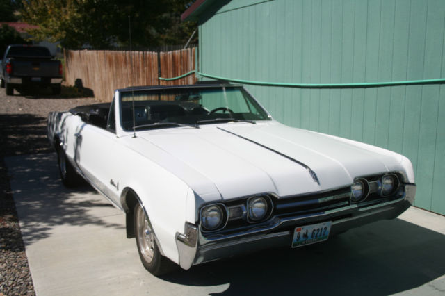 1967 White Oldsmobile Cutlass Convertible