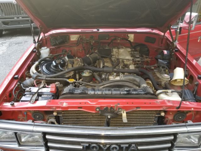 1990 Red Toyota Land Cruiser