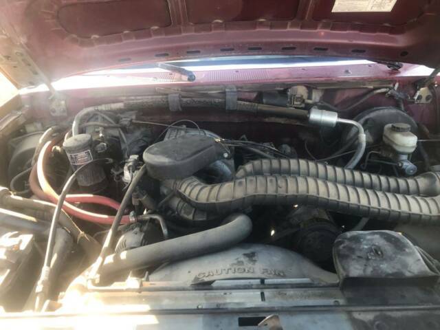 1993 Burgundy Ford Bronco SUV