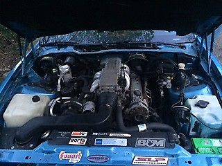 1990 Blue Pontiac Firebird Coupe w/ T Tops