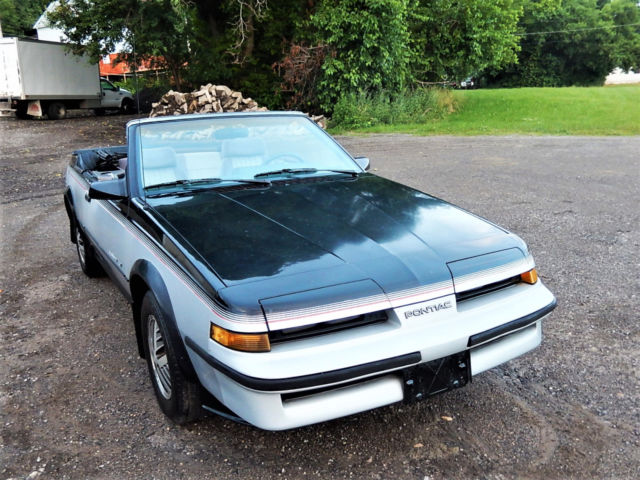 1986 Black/Silver Pontiac Sunbird Convertible