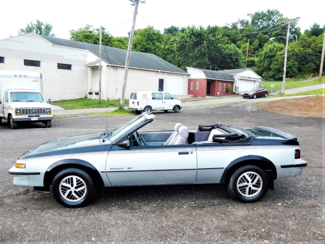 1986 Black/Silver Pontiac Sunbird Convertible