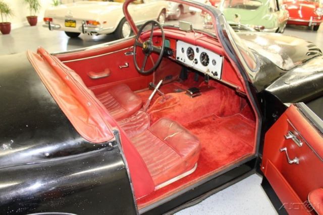 1960 Black Jaguar XK Convertible