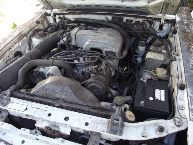 1987 White Ford Mustang Convertible