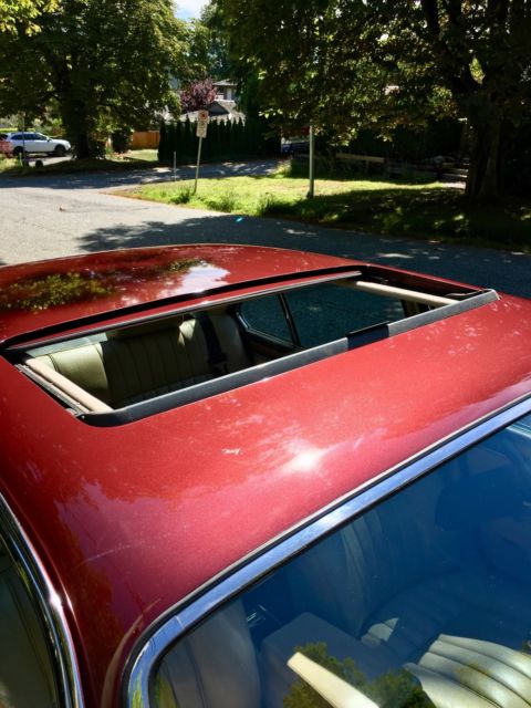 1988 Burgundy Jaguar XJ12 Sedan