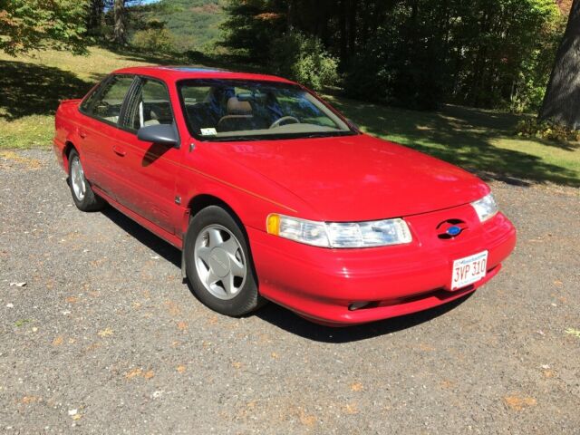 1994 Red Ford Taurus Sedan
