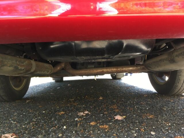 1994 Red Ford Taurus Sedan