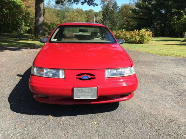 1994 Red Ford Taurus Sedan