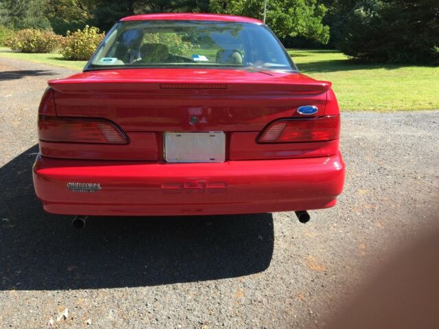 1994 Red Ford Taurus Sedan