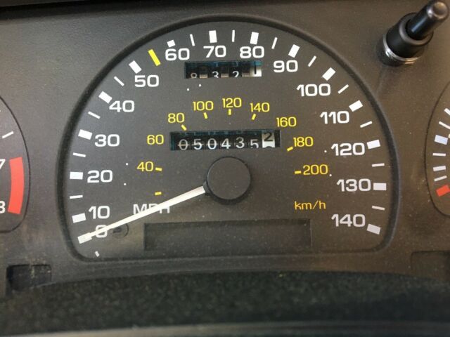 1994 Red Ford Taurus Sedan