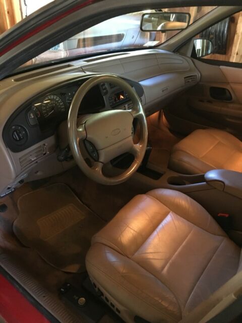 1994 Red Ford Taurus Sedan