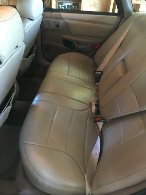 1994 Red Ford Taurus Sedan