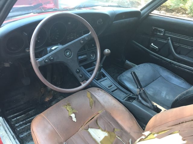 1974 Orange and black Toyota Celica 2 door coupe