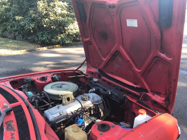 1974 Orange and black Toyota Celica 2 door coupe