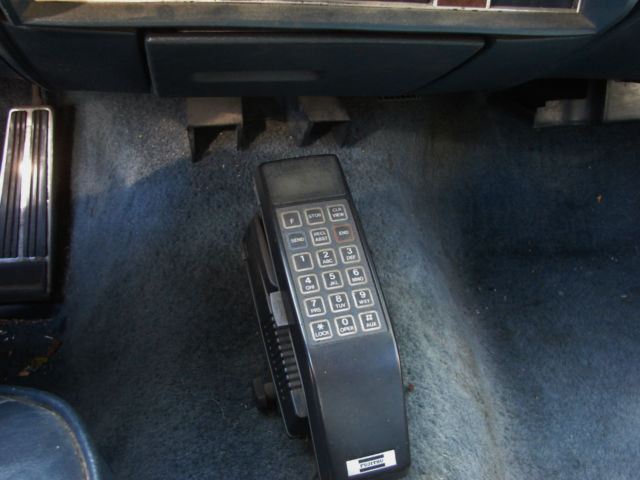 1987 Blue Cadillac Brougham Sedan