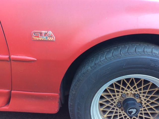 1987 Red Pontiac Trans Am 2 dr