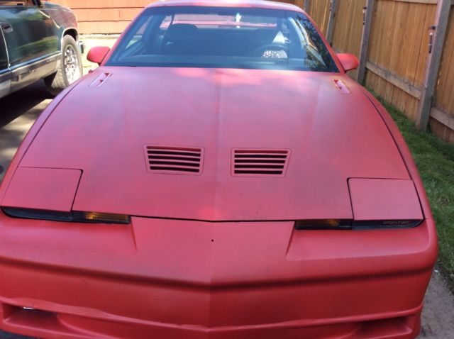 1987 Red Pontiac Trans Am 2 dr