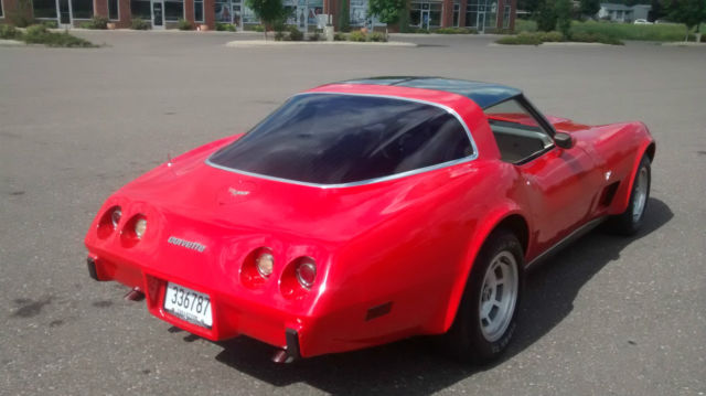 1979 red Chevrolet Corvette Coupe