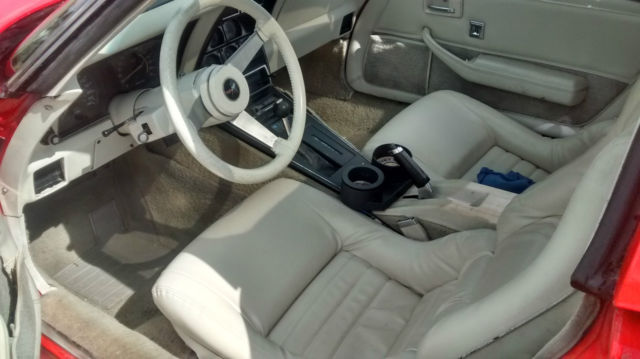 1979 red Chevrolet Corvette Coupe