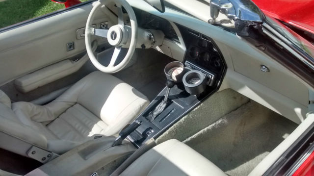 1979 red Chevrolet Corvette Coupe