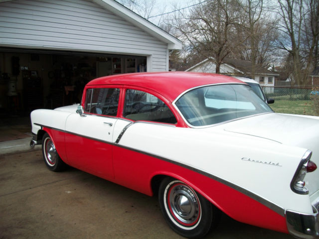 1956 red and white Chevrolet Bel Air/150/210 Sedan
