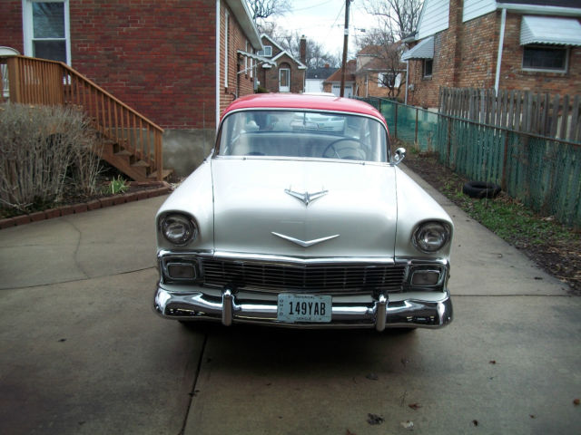 1956 red and white Chevrolet Bel Air/150/210 Sedan