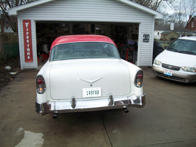 1956 red and white Chevrolet Bel Air/150/210 Sedan