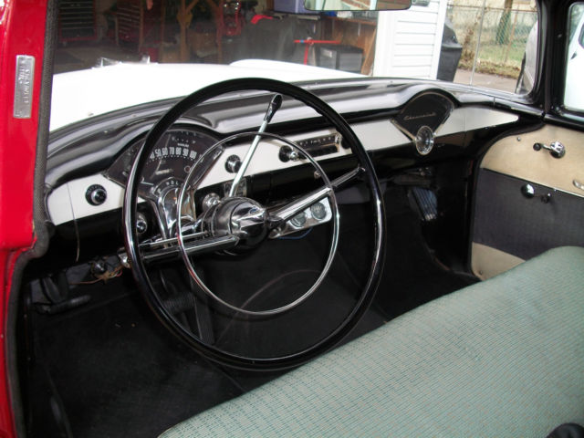 1956 red and white Chevrolet Bel Air/150/210 Sedan