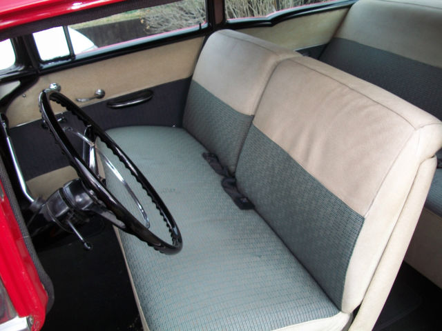 1956 red and white Chevrolet Bel Air/150/210 Sedan