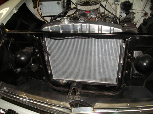 1956 red and white Chevrolet Bel Air/150/210 Sedan