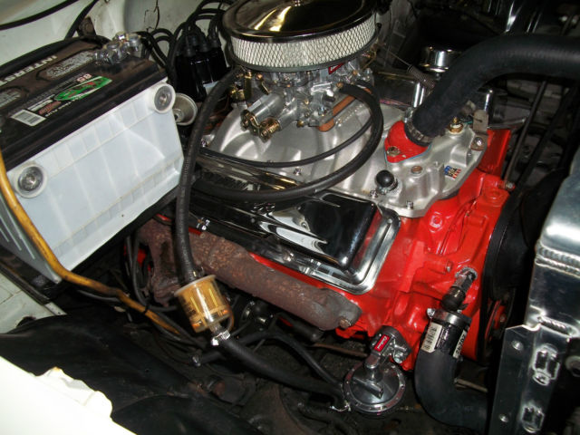 1956 red and white Chevrolet Bel Air/150/210 Sedan