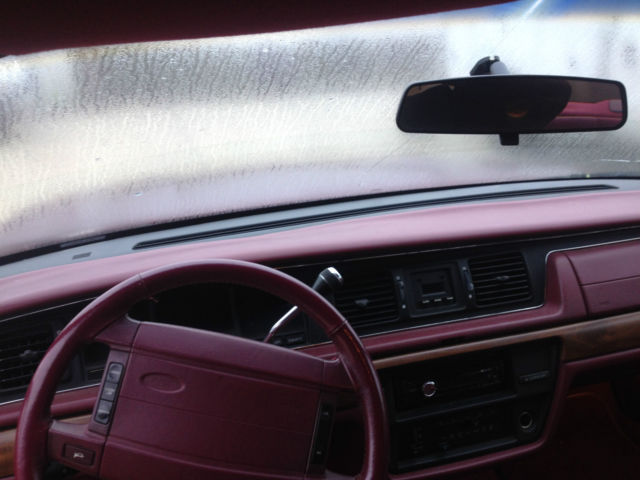 1992 red ish Ford Crown Victoria 4door