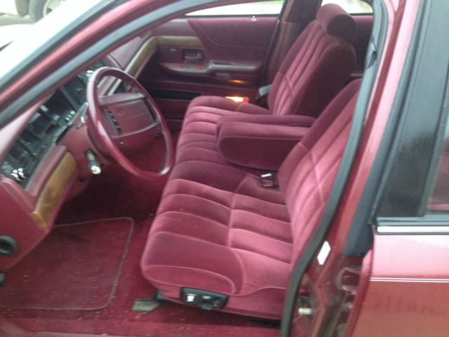 1992 red ish Ford Crown Victoria 4door