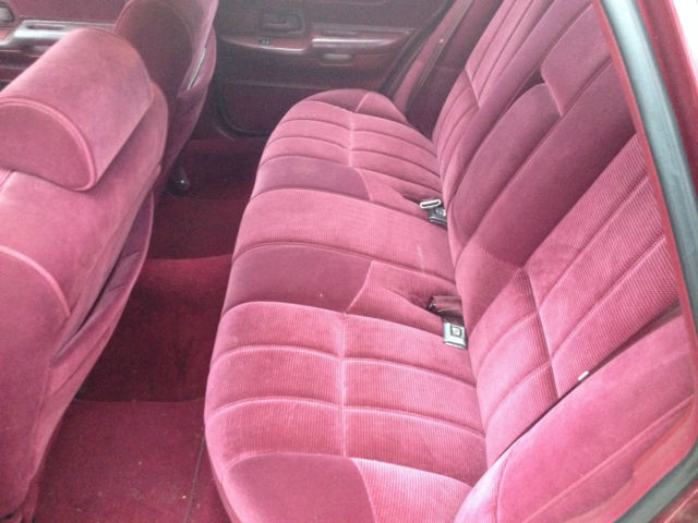 1992 red ish Ford Crown Victoria 4door