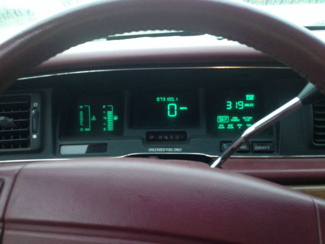 1992 red ish Ford Crown Victoria 4door