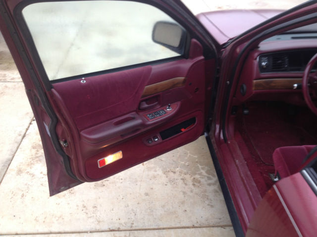 1992 red ish Ford Crown Victoria 4door